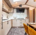 Regal Cranleigh Lodge holiday home for sale at Pearl Lake Country Holiday Park. Kitchen dining area photo