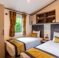 Regal Cranleigh Lodge holiday home for sale at Pearl Lake Country Holiday Park. Twin bedroom photo