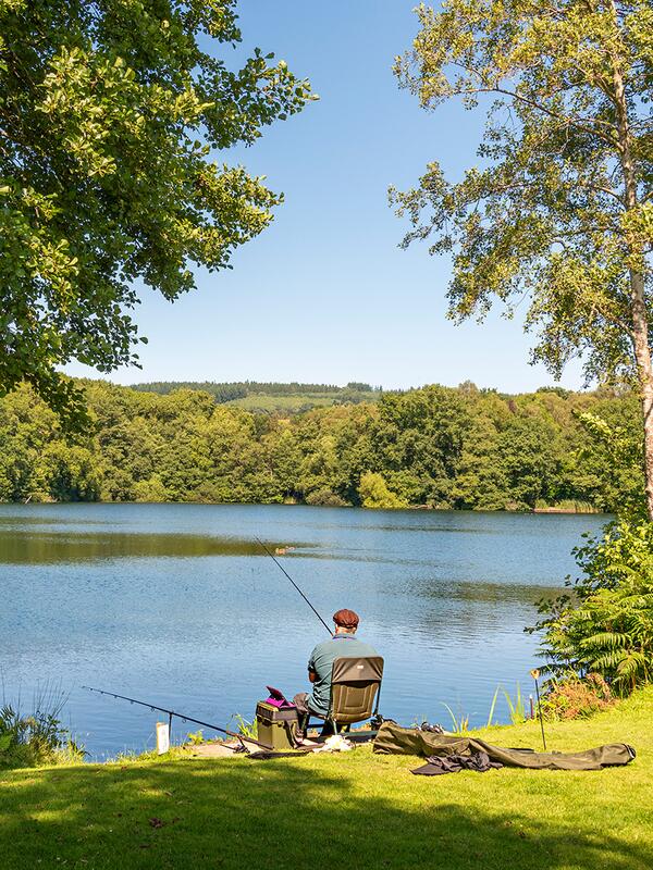 Caravan site with fishing lake, Herefordshire. Fisherman photo