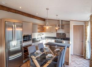 Lake edge Pemberton Rivendale Lodge kitchen dining area photo