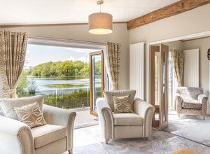 Lake edge Pemberton Rivendale Lodge living area photo