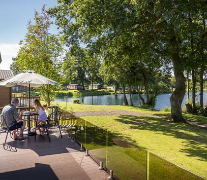 Lake edge luxury holiday lodges for sale at Pearl Lake