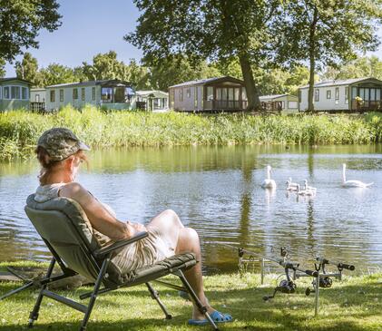 Caravan holiday park with fishing and swans 5 star