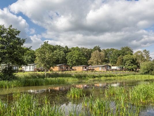 Lake edge luxury holiday lodges overlooking Park Pool at Pearl Lake, Herefordshire
