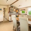 ABI Beaumont for sale on Lake view plot at Pearl Lake Country Holiday Park. Kitchen dining photo
