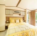 ABI Beaumont for sale on Lake view plot at Pearl Lake Country Holiday Park. Main bedroom photo