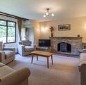 Holiday cottage with golf course - lounge photo