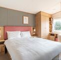 ABI Roecliffe caravan holiday home for sale at Discover Parks master bedroom photo