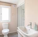 Regal Charmouth holiday home for sale at Discover Parks - family shower room photo
