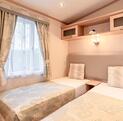 Pemberton Glenluce holiday home for sale at Pearl Lake 5 Star holiday park. Twin bedroom photo