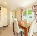 Regal Inspiration holiday home for sale at Pearl Lake Country Holiday Park - kitchen dining area photo