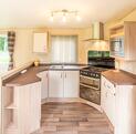 ABI Sunningdale Premier holiday home for sale at Pearl Lake Country Holiday Park, Herefordshire. Kitchen photo